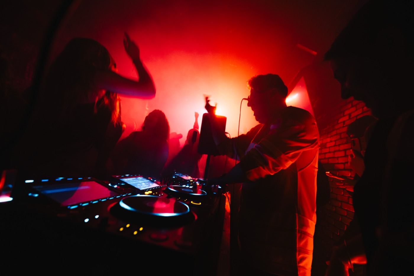 Harrison performing a live vocal DJ set